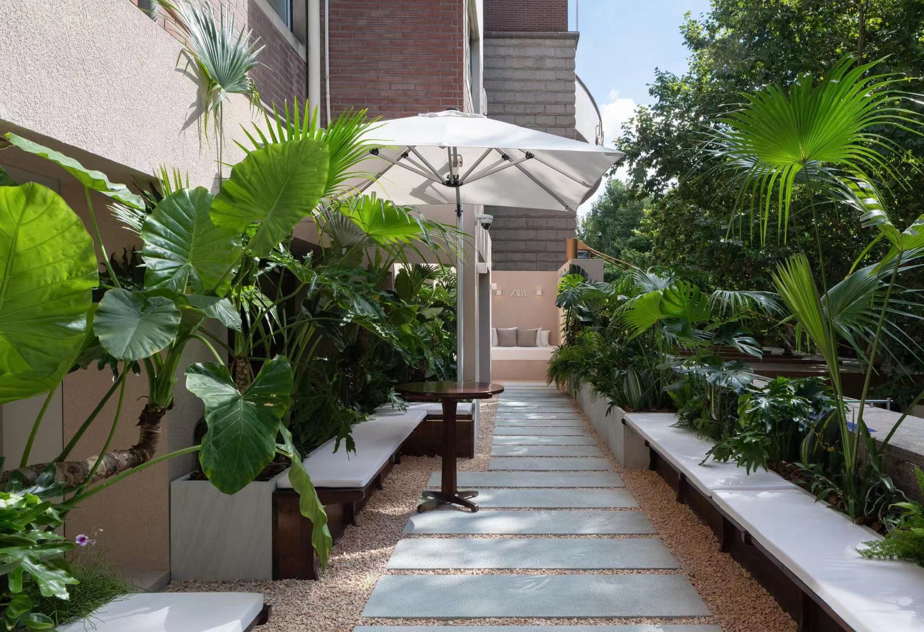 Chilling outside in the autumn in the former French Concession at Zara's pop up store